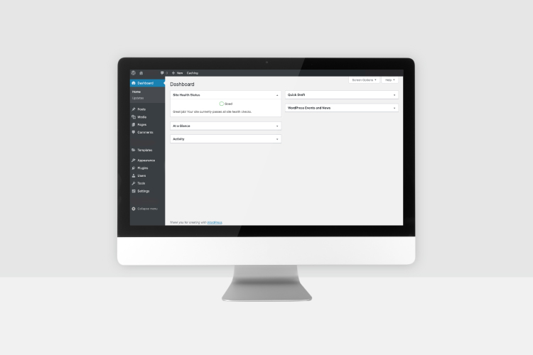 Digital mockup of Wordpress dashboard, displayed on desktop computer and mobile phone screen.